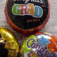 Graduation Balloon Bouquet Bb123 · Celebrate the Grad! Six balloon bouquet with weight.
LOCAL DELIVERY ONLY.
Styles may vary.

...
