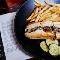 Philly Cheese Steak · Chopped steak or diced chicken, fried onions and melted American cheese stuffed in a torpedo...