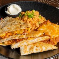 Quesadillas · Your choice of grilled chicken, jerk chicken or London broil with sautéed onions, peppers, a...