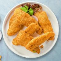 Chicken Tenders · Chicken tenders breaded and fried until golden brown. Served with your choice of dipping sau...