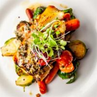 Cod Fish  · Pan seared cod crusted with pistachios, served with brussels, heirloom carrots and finished ...