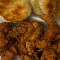 Fried Chicken And Biscuits · 3 pieces of fried chicken served with 2 buttered honey-drizzled biscuits