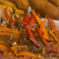 Fish & Festivals · Red Snapper fried or escovitched served with fried dumplings (flour and cornmeal).