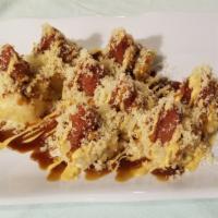 Mt. Mckinley (1) (Deep Fried) · Raw, spicy. In: crab meat, avocado, cream cheese, out: spicy tuna, tempura flake, sauce: swe...