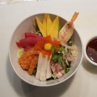 Hwe Dup Bap · Mixed vegetables and raw fish served with steamed rice and specialty hot sauce.