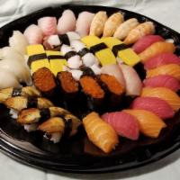 Party Sushi Plate (40) · Includes side of Dragon roll and crunch roll.
