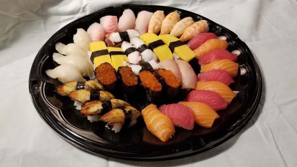 Party Sushi Plate (40) · Includes side of Dragon roll and crunch roll.