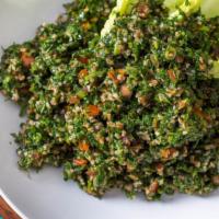Tabouli · Vegetarian. Chopped parsley, tomatoes, lettuce, mint, and cracked wheat in olive oil and lem...