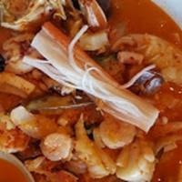 Korean Seafood Stew · New Zealand mussels, scallops, Asian squid, and shrimp in spicy broth. Served with rice.