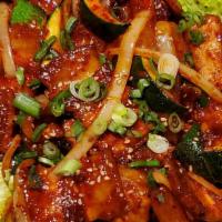 Spicy Pork Belly · Pork belly wok-fired with gochujang, . zucchini, and onion.