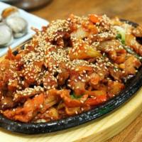 Spicy Pork Bulgogi · Wok-fried pork strips and vegetables in Korean chili sauce