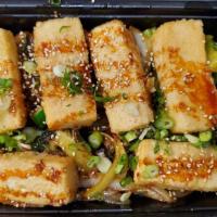 Tofu & Veggie Teriyaki · Wok-fired vegetables and deep fried tofu. Topped with teriyaki sauce.
