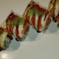 Salmon Wow · Shrimp tempura, spicy tuna, cucumber inside. Topped with salmon, lemon, eel sauce, white sau...