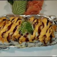 Silver Moon · California roll topped with lobster salad, mozzarella cheese. Baked and apply eel sauce, spi...