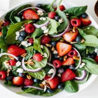 Berry Berry Good Salad · Spinach & mixed greens, blueberries, strawberries, feta, almonds, raspberry vinaigrette.