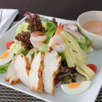 Chef Salad · Iceberg & romaine, roast beef, turkey, swiss, tomato, onion, Russian dressing.