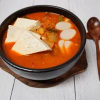 Kimchi Soup · Spicy kimchi stew with pork and tofu, served with rice.