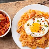 Veggie Kimchi Fried Rice · Fried rice with kimchi, vegetable and fried egg on top.