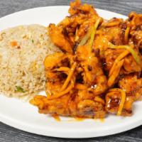 Orange Chicken · Crispy chicken in a sweet and tangy orange sauce. Serve with choice of white rice or fried r...