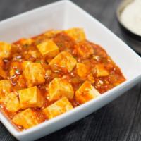 Veggie Mapa Tofu Rice · Stir-fried tofu, veggie and chili sauce, served with rice.