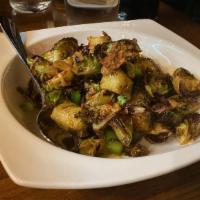 Crispy Brussels Sprouts · Red and green bell peppers, cherry tomato, crispy shallots, and sweet chili dressing.