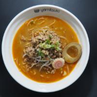 Tan Tan Ramen · Mild spicy miso and chicken broth with sesame paste and wavy noodles topped with minced pork...