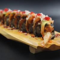 Yamitsuki Roll · Shrimp tempura, topped with spicy tuna, eel, masago, salmon crunch avocado with special sauce.