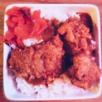 Curry Karaage Chicken · Tempura karaage chicken served with Japanese curry sauce over steamed white rice and mixed s...