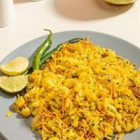Poha  · A light dish of steamed rice flakes with tempered tropical spices, roasted peanuts, and cris...