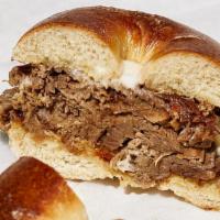 Oven Brisket Sandwich · Your Choice of Bagel. Oven Roasted Brisket, Au Jus, Melted Provolone Cheese, Horseradish Mayo
