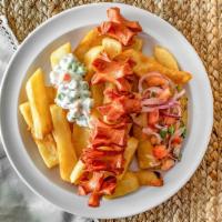 Salchipapa · French fries with hot dog sausages, topped with onion & tomato salad