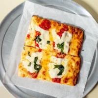 Brooklyn Pizza
 · Grande mozzarella cheese, fresh plum tomatoes topped with fresh mozzarella & basil.