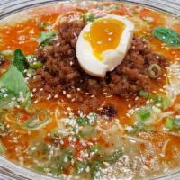 Tan Tan Ramen · Spicy. Shoyu. Spicy ground pork, egg, sesame sauce, spinach and scallion.