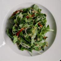 Arugula Salad · Pickled Peppers, Shaved Shallots, Lemon and Herb Vinaigrette, with Toasted Sunflower Seeds