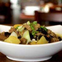 Pingsha · Clear sweet potato noodles with baby potatoes, black mushroom, bok choy, and beef chunks.
