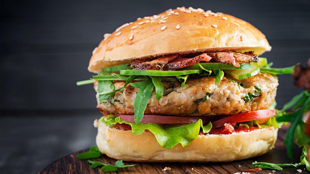 Turkey Burger · 100% fresh ground turkey burger with lettuce, tomatoes, and cheese.