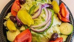 Greek Salad With Gyro · Delicious salad with feta cheese, olives, pepperoncini, tomatoes, cucumber, red onion, green...