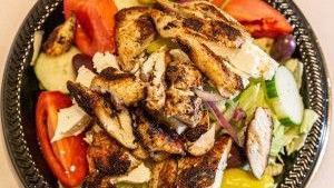 Grilled Chicken Salad · Iceberg lettuce, tomatoes, green pepper and red onion with grilled chicken.