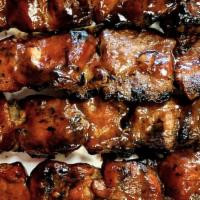 Bistro Bbq On A Stick · Grilled skewered pork marinated in special sauce.