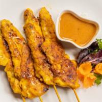 Chicken Satay · Marinated chicken tender grilled on skewers. Served with a specially prepared peanut sauce.