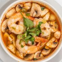 Tofu Tom Yum Soup · A traditional Thai style soup with lemongrass, lime leaves and lime juice with a pinch of sp...