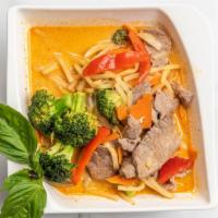 Beef Red Curry Thai · Spicy. Beef with coconut milk, red curry paste, bamboo shoots, carrot, bell peppers and basi...
