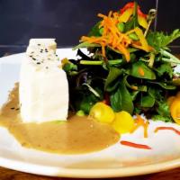 Tofu Avocado Salad · Tofu & Avocado served over mixed spring greens with miso dressing. 

*Vegetarian