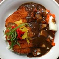 Katsu Curry · Choice of panko breaded pork or chicken cutlets, served with carrots, potatoes and other veg...