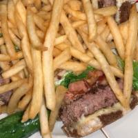 Angus Cheeseburger · Contain or may contain raw or undercooked ingredients. Consuming raw or undercooked meats, p...