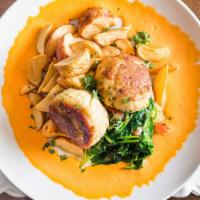 Crab Cakes · Pan seared with red pepper aioli, sautéed spinach and roasted potatoes