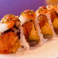 Volcano Roll · Spicy crunchy tuna roll with avocado and hot spicy sauce on top.