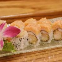 Megu Roll · Shrimp tempura and crab stick inside with lobster on top.