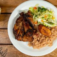 Lunch Jerk Chicken · Served with white rice, or rice & peas & steamed veggies.