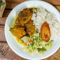 Curry Chicken · Served with, white rice, or rice & peas, steamed vegetable & sweet plantain.